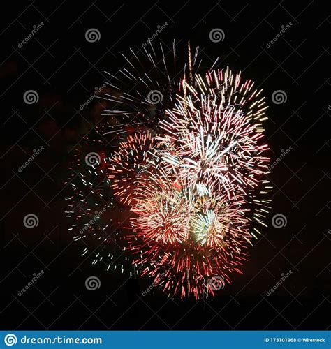 Beautiful Shot Of Fireworks Under The Dark Night Sky Stock Photo