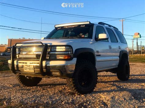 2003 Chevrolet Tahoe With 16x8 American Racing Ar202 And 26575r16