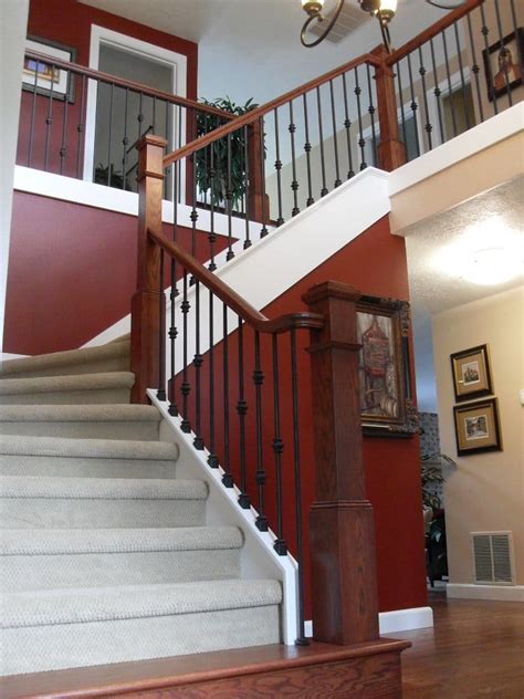 This is an instructional video on how to install wrought iron balusters on flat loft and angled stairs. Stained box newel post and handrail with satin black ...