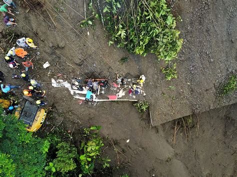 at least 27 dead in colombia landslide that buried a bus floods news al jazeera