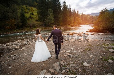 Fulllength View Hugging Newlywed Couple Background Stock Photo