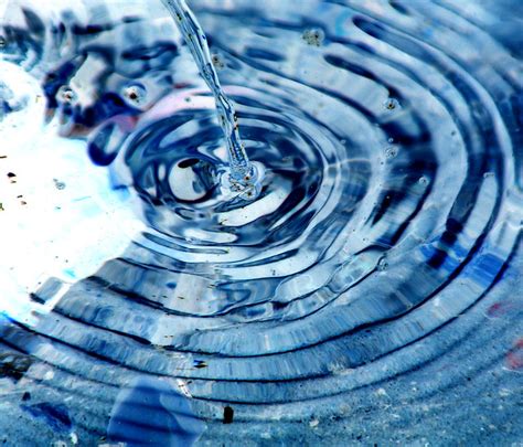 Ripples are little waves on the surface of water caused by the wind or by something. Ripple Effect Blue | Flickr - Photo Sharing!