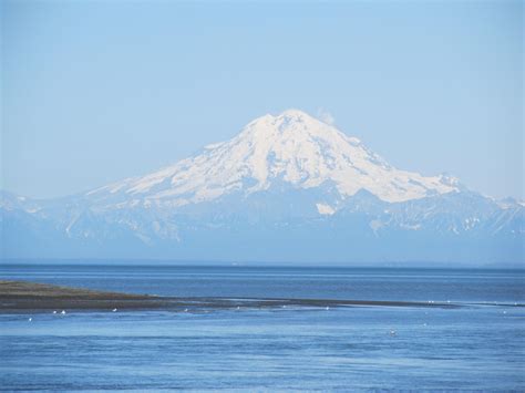 A View Of The Mountain Across Cooks Inlet From Kenai Beach In Alaska