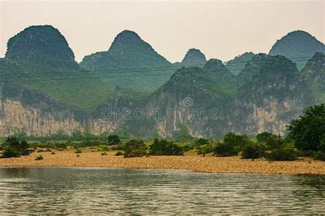 Karst Mountain Scenery Under Silver Sky Along Li River In Guilin China