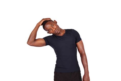 Fit Black Man Doing Side Neck Stretch To Relieve Knee Pain