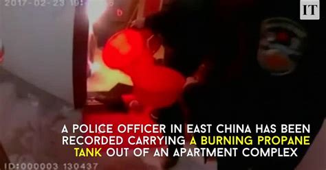 Police Officer Heroically Carries Blazing Propane Tank Out Of Apartment