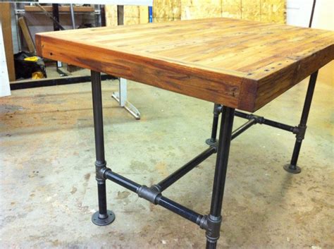 Pricing, promotions and availability may vary. Reclaimed industrial kitchen island/dining table featuring ...