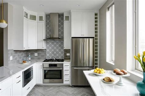 Portable kitchen islands may be moved and a wine rack has to be dependable. Contemporary kitchen features an enclosed refrigerator ...