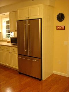 • cabinet installation order 1. Is there a stainless refrigerator with stainless sides?