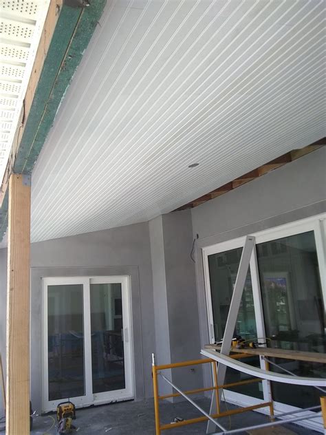 This porch features stunning views of the lake and running trails. Vinyl Beadboard Ceiling