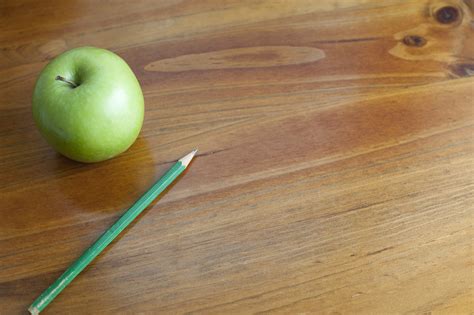 Free Stock Photo 7024 School Desk With Pencil And Apple Freeimageslive