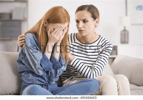 Young Depressed Woman Crying Being Comforted Stock Photo 691424653
