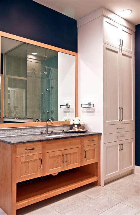 Master Bathroom With Full Height Linen Cabinet And Custom Vanity With