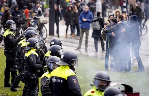 Dutch Police Blast Angry Anti Lockdown Protestors With Water Cannon In Amsterdam Daily Mail Online