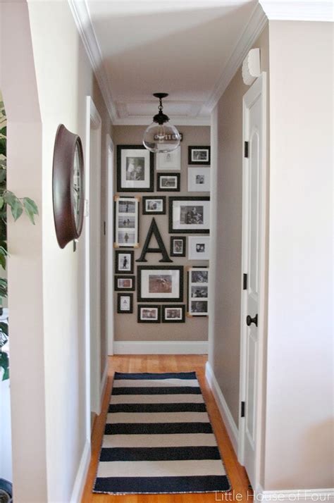 To make a great gallery wall, start with your favorite images like photographs, drawings, or art, and then start adding in the things you cherish like postcards from favorite vacations, your grandmother's. Updated Hall Gallery Wall | Little House of Four ...