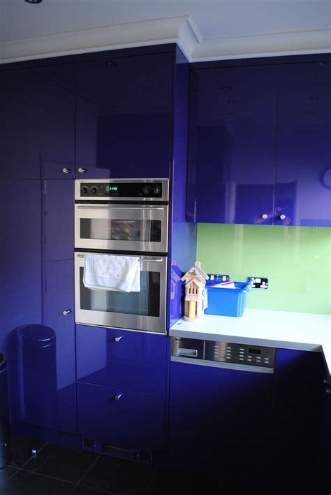 High gloss painted kitchen cabinets pictures. Utility room / Cupboards painted in purple high gloss ...