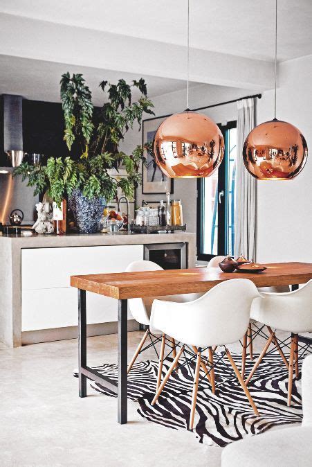 This white glass extendable kitchen table opens up by rotating 180 degrees as expanding glass elongates this oval table. We love this bold dining room look; especially the round ...