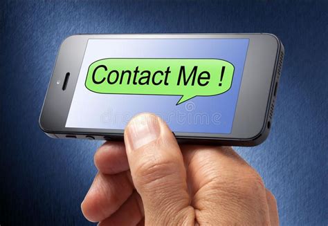 Contact Me Cell Phone A Hand Holding A Cell Phone With Contact Me On