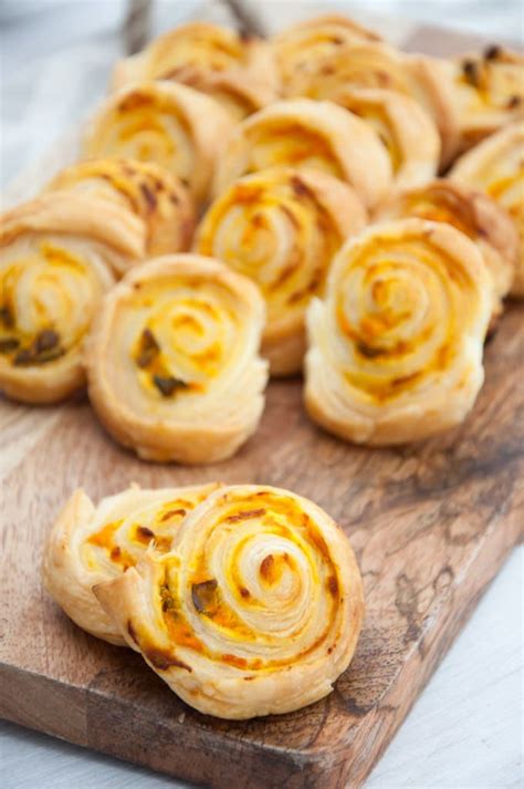 recipe for super quick and easy vegan pumpkin basil pinwheels made with vegan puff pastry they