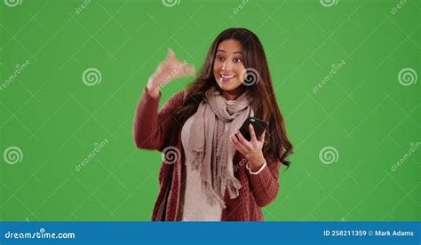 Attractive Hispanic Female Gesturing For A Friend To Join Her On Green Screen Stock Video