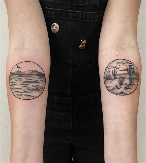 This landscape tattoo design includes many different types of elements and symbols. Matching circular lake and desert landscapes inked on both inner forearm | Landscape tattoo ...