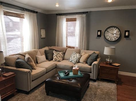 Tones of sand, oat, camel and fawn speak of the natural world, and. Behr Downtown Gray, cream couch in 2019 | Beige living ...