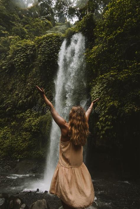 A Girl Poses In A Bikini In A Waterfall In A Forest Stock Image Image