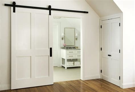 Mostly seen in closets or the kitchen pantry. En Suite Bathroom with Barn Door on Rails - Transitional ...