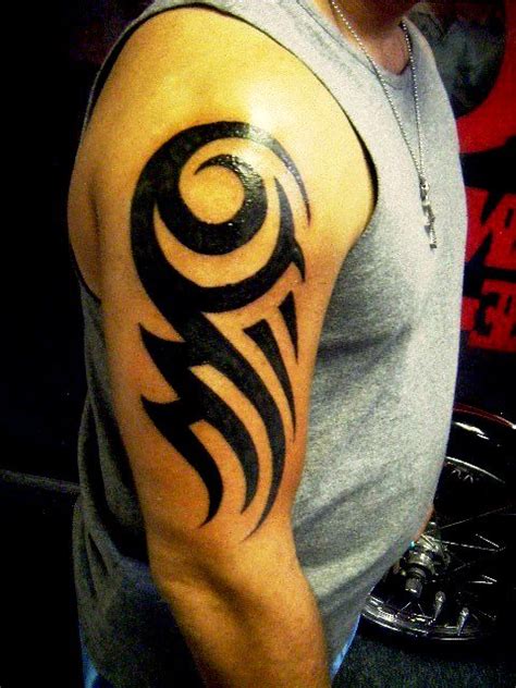 And if this video made. Tribal Arm Piece Tattoo | Flower tattoos, Tattoo Girlie ...