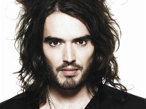 Russell brand looks back at the moment he called a reporter a 'snide' during a broadcast of the new era housing estate protest outside 10 downing street. Russell Brand's awakening isn't helping anyone | SCAN