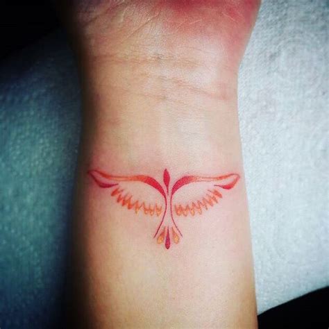 Small Elegant Tattoo Of A Phoenix Bird Phoenix Tattoo