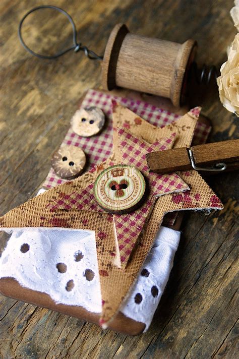A Wooden Table Topped With Buttons And Fabric