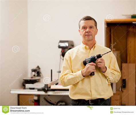 Senior Man Holding Power Drill Stock Photo Image Of Craftsman