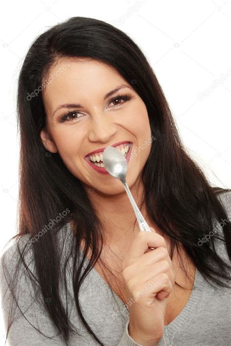 Woman With Spoon In Her Mouth Stock Photo Piotr Marcinski