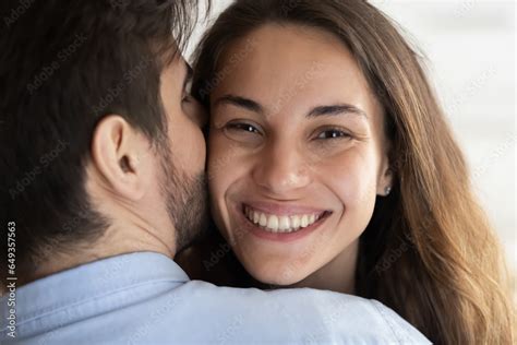 Close Up Loving Man Kissing Smiling Beautiful Woman Cheek Head Shot Portrait Happy Wife