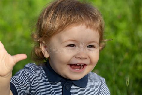 Portrait Of Cute Excited Boy Having Fun In Garden Baby Face Close Up