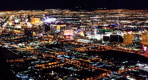 Las Vegas City Lights From Airplane At Night Photograph By Alex Grichenko