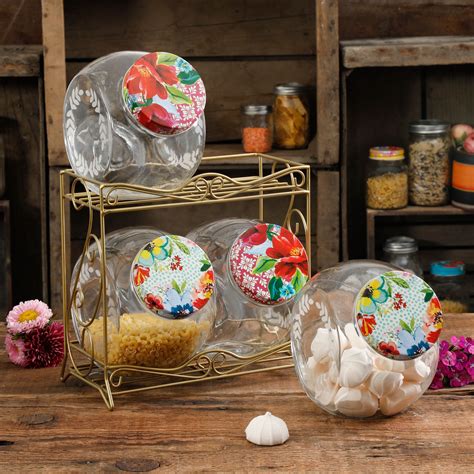 I have several items of pioneer woman this will complaint my items. The Pioneer Woman Floral Medley Glass Storage Jars with ...