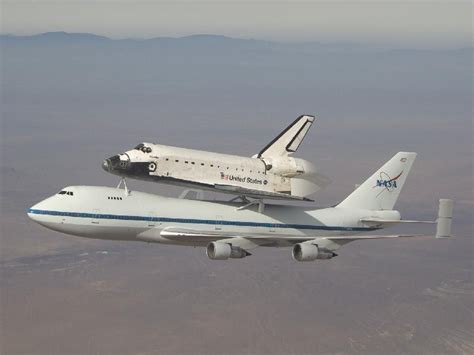 Piggyback Ride Space Shuttle Atlantis Is Carried By One Of Nasas
