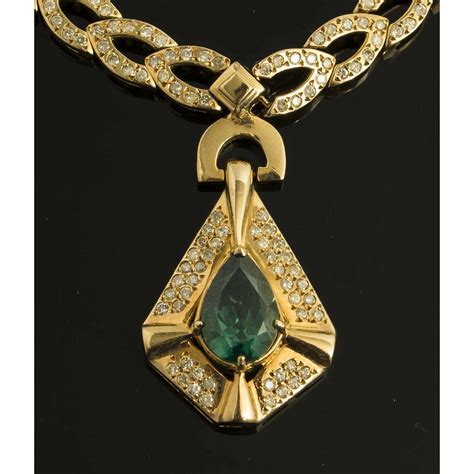 About 17 necklace with additional 1 extender and a lobster. Teal Topaz 14k Gold Necklace | Witherell's Auction House