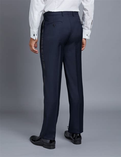 Discover a wide range of colours and designs in this contemporary look. Men's Navy Slim Fit Suit Pants | Hawes & Curtis