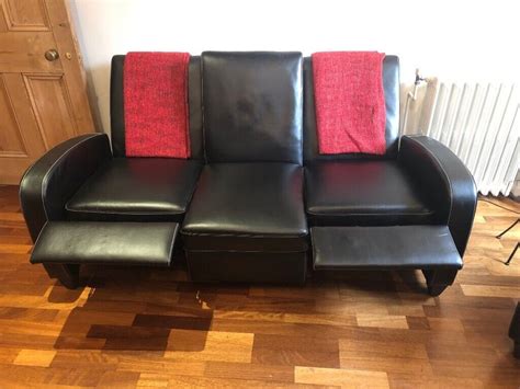 Black Leather Reclining Sofa And Armchairs In Westminster London