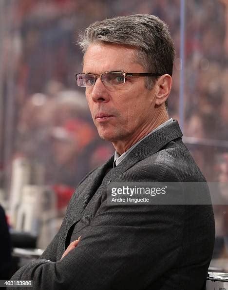 Head Coach Dave Cameron Of The Ottawa Senators Looks On From The