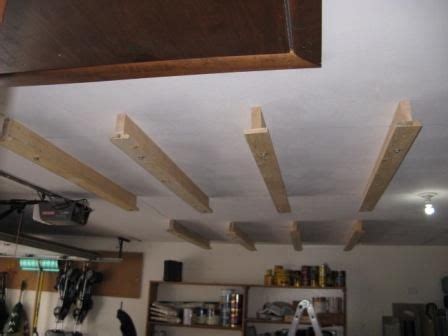 This quick build will keep things upright and ensure that the items take up as little space as possible. Clever overhead garage storage hack | Overhead garage storage, Ceiling storage, Garage storage ...