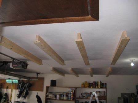 Replacing my shelves that i made with nice shelves from fleximounts and painting my work table. Storage Idea | Diy overhead garage storage, Overhead ...