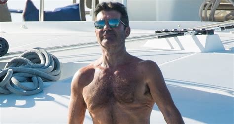 simon cowell shows off his abs while vacationing in barbados shirtless simon cowell just