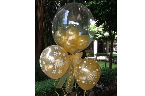 Un completo listado de empresas de decoración para tu boda o evento. Decoración con globos y Candy bar estilo Vintage para ...
