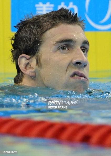 us swimmer michael phelps grimaces as he checks the scoreboard after news photo getty images
