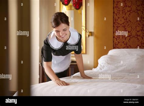 Chambermaid Making Bed Hi Res Stock Photography And Images Alamy