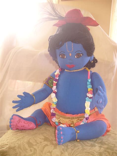 Hand made Baby Krishna Doll. His face is embroidered. His arms 